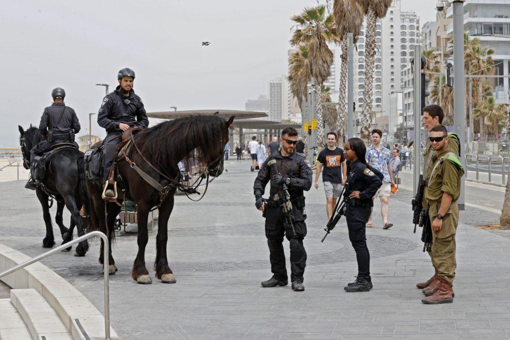 Israeli mounted police patrol the centre of Israel's Mediterranean coastal city of Tel Aviv on April 8, a day after a Palestinian gunman killed two Israeli men and wounded several others. Photo: AFP