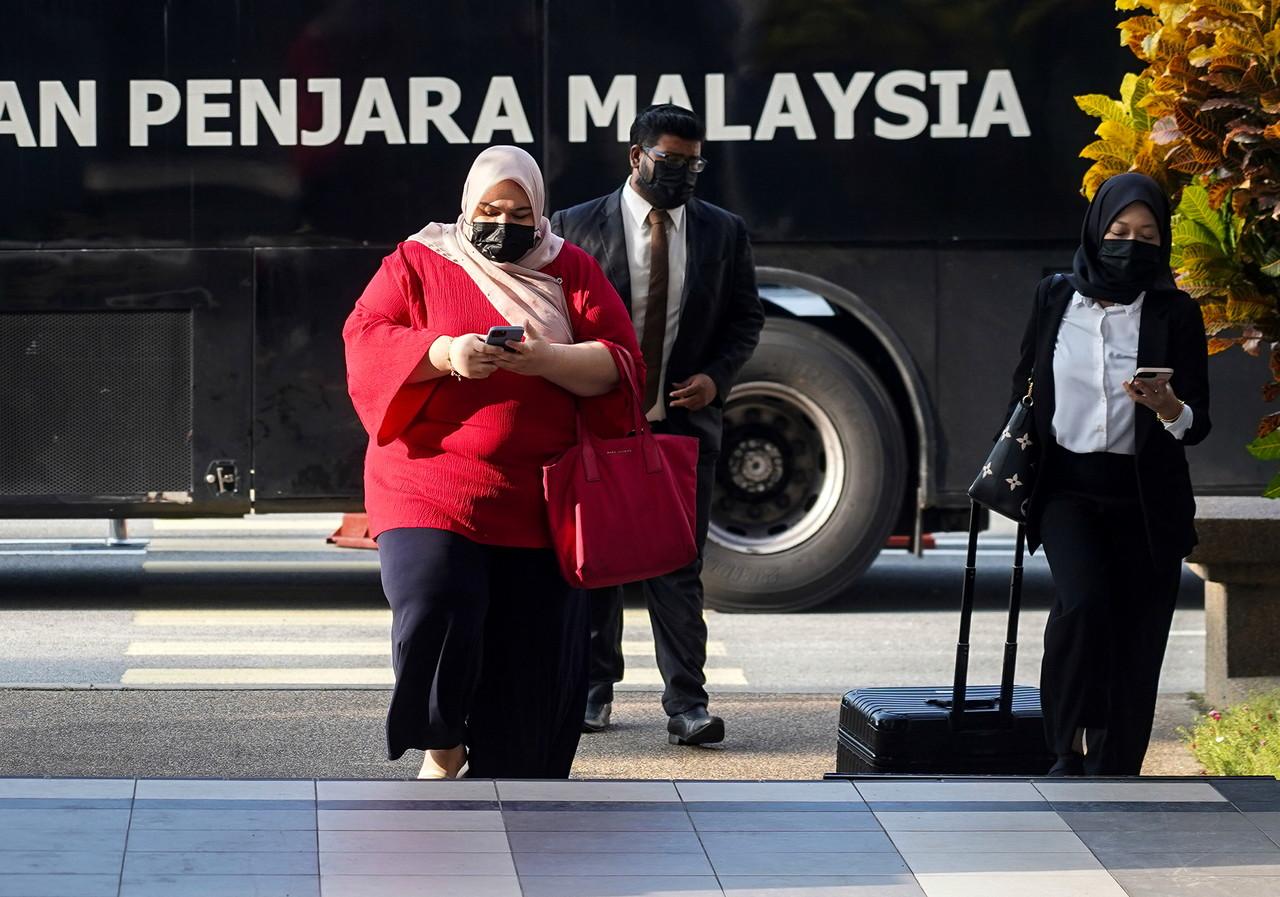 Rumah Bonda founder Siti Bainun Ahd Razali (left) arrives at the Kuala Lumpur court complex today. Photo: Bernama