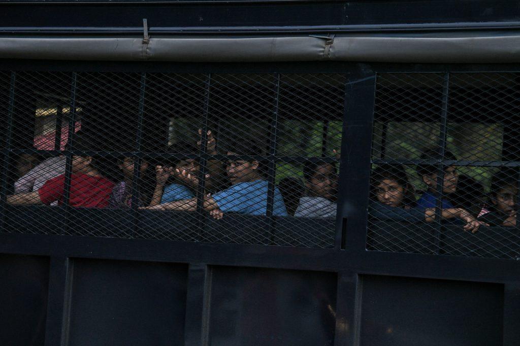 Lori jabatan imigresen mengangkut tahanan depoh sementara di Sungai Bakap selepas mereka ditahan semula ketika melarikan diri. Gambar: Bernama