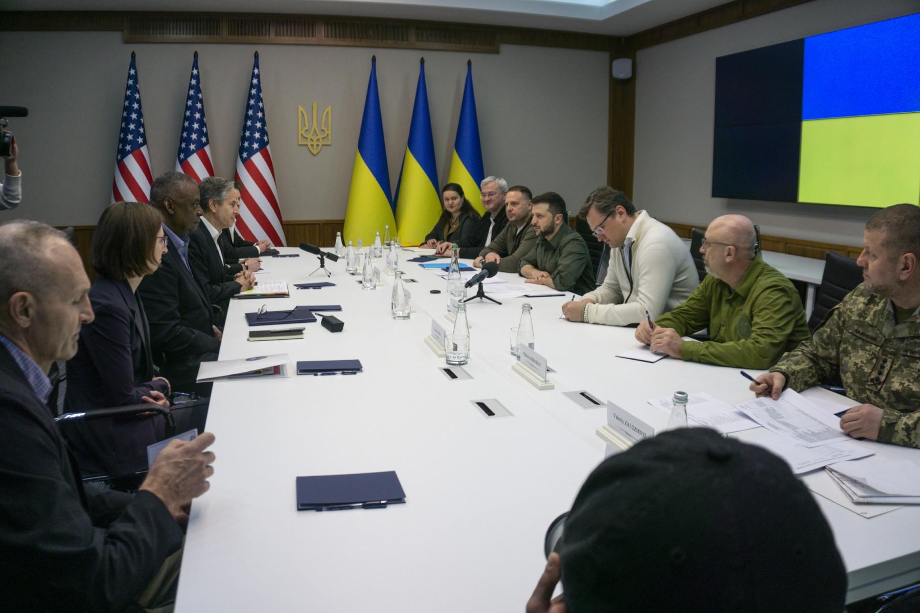 In this image provided by the Department of Defense, Secretary of Defense Lloyd Austin (third left), and Secretary of State Antony Blinken (fourth left), meet with Ukrainian Foreign Minister Dmytro Kuleba (third right) and Ukrainian President Volodymyr Zelensky (fourth right), on April 24 in Kyiv, Ukraine. Photo: AFP