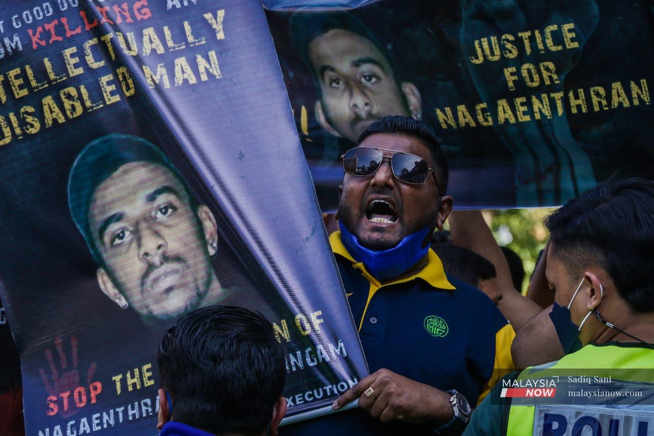 A protester shouts at a gathering in front of the Singapore High Commission in Kuala Lumpur last weekend, ahead of Nagaenthran K Dharmalingam’s execution slated for tomorrow morning.
