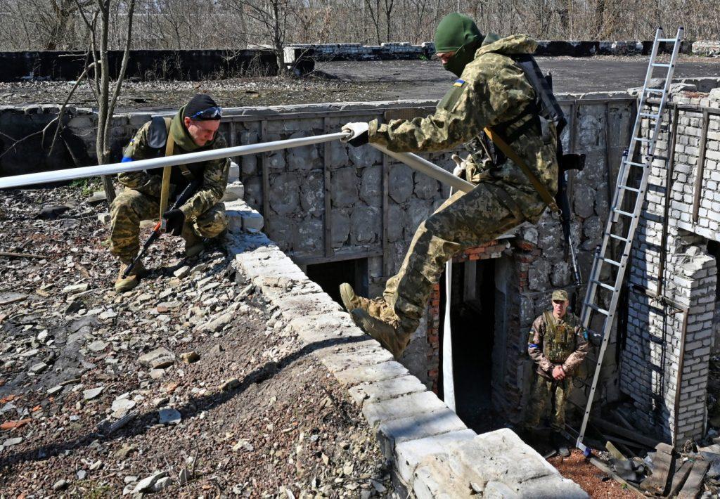 Members of the Ukrainian Territorial Defence Forces attend tactical, combat and first aid training course during Russia's military invasion launched on Ukraine, in Kharkiv on April 7. Photo: AFP