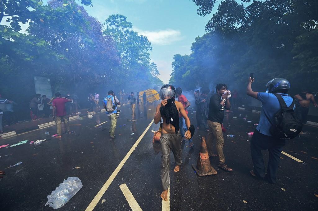 Police use tear gas to disperse university students protesting to demand the resignation of Sri Lanka's President Gotabaya Rajapaksa over the country's crippling economic crisis, near the parliament building in Colombo on May 6. Photo: AFP