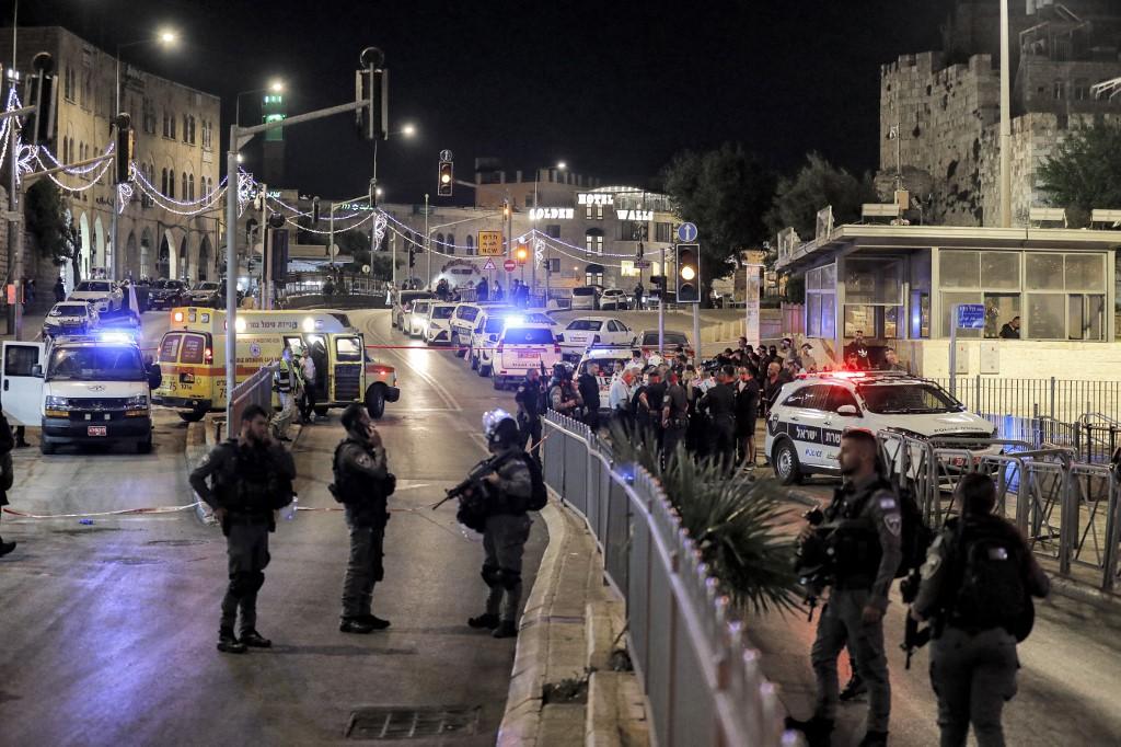 Israeli security forces gather at the scene of a stabbing attack at the Damascus Gate of the Old City of Jerusalem on May 8. Photo: AFP