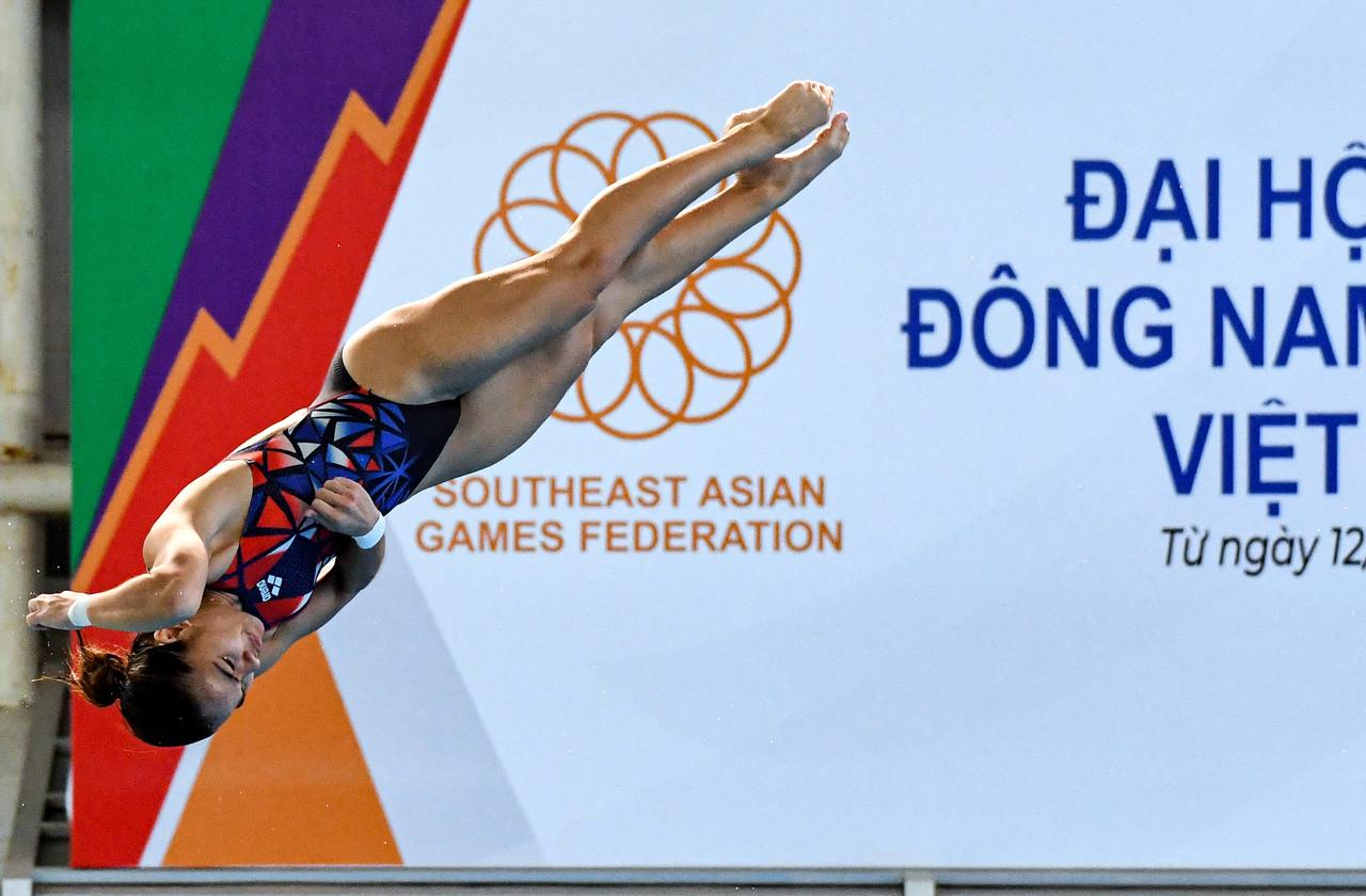 National diver Nur Dhabitah Sabri performs in the final of the women's one-metre springboard individual event, where she won Malaysia's first gold medal at the 31st SEA Games in Hanoi on May 8. Photo: Bernama