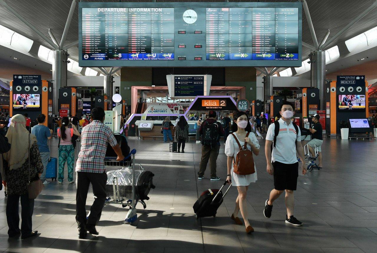 Passengers make their way through klia2 in Sepang during the Hari Raya Aidilfitri break on April 30. Photo: Bernama