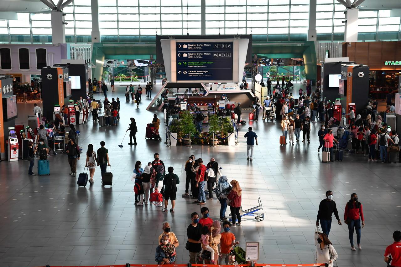 Travellers make their way through klia2 in Sepang on April 30. Photo: Bernama