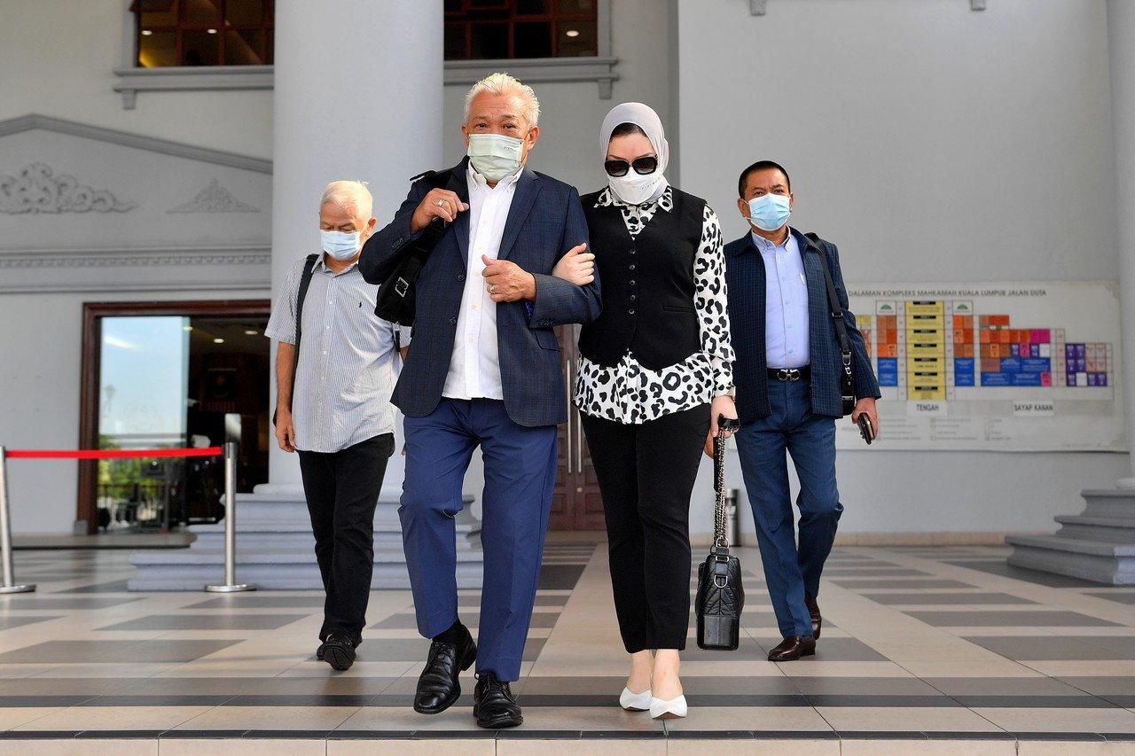 Kinabatangan MP Bung Moktar Radin (second left) with his wife Zizie Izette Abdul Samad at the Kuala Lumpur court complex on April 25. Photo: Bernama