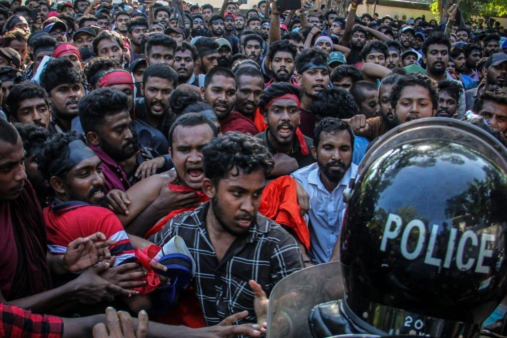 University students protest outside the residence of Sri Lanka Prime Minister Mahinda Rajapaksa during a demonstration over the country's crippling economic crisis in Colombo on April 24. Photo: AFP