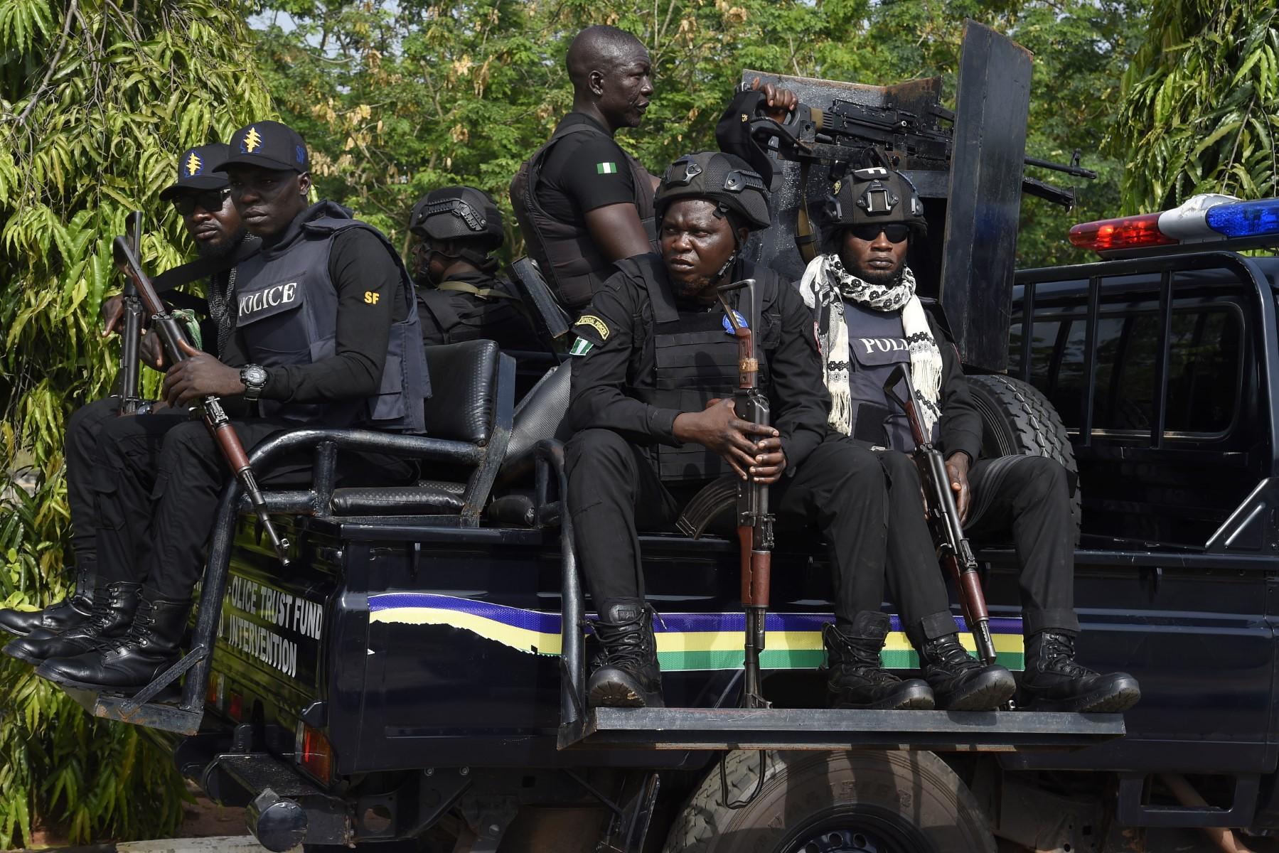 Police officers sit on a truck ahead in Akwa, Anambra state in southeast Nigeria, in this Nov 3, 2021 file photo. Photo: AFP