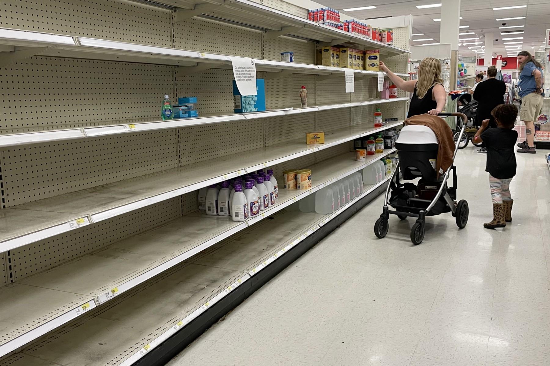 A woman shops for baby formula at Target in Annapolis, Maryland, on May 16, as a nationwide shortage of baby formula continues due to supply chain crunches tied to the coronavirus pandemic that have already strained the country’s formula stock. Photo: AFP