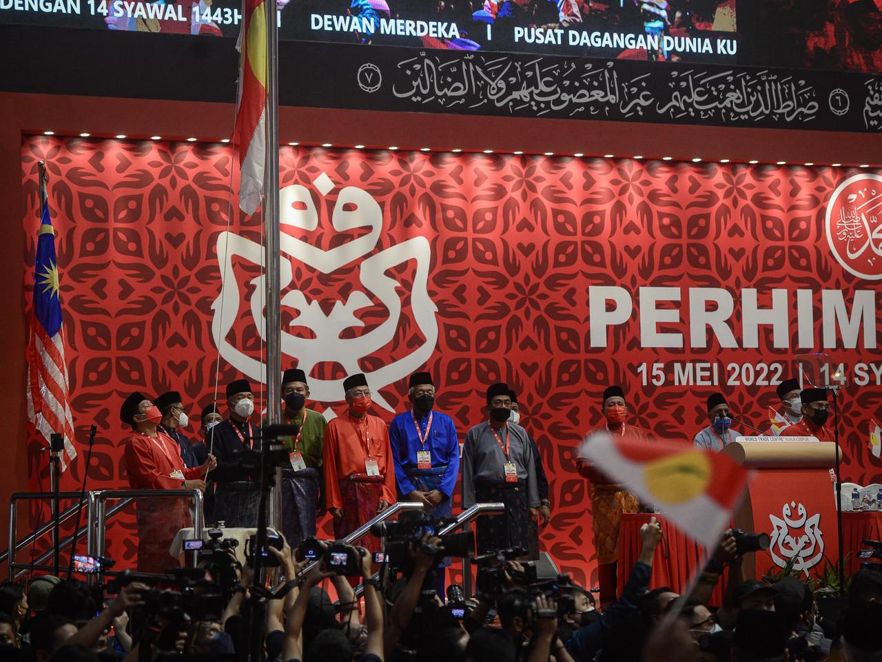 Umno president Ahmad Zahid Hamidi stands onstage with other party leaders including Mohamad Hasan and Ismail Sabri Yaakob during the special general assembly at the World Trade Centre in Kuala Lumpur on May 15. Photo: Bernama