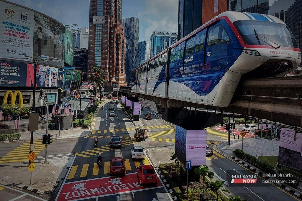 Traffic builds up at the intersection of Jalan Sultan Ismail and Jalan Bukit Bintang in Kuala Lumpur.