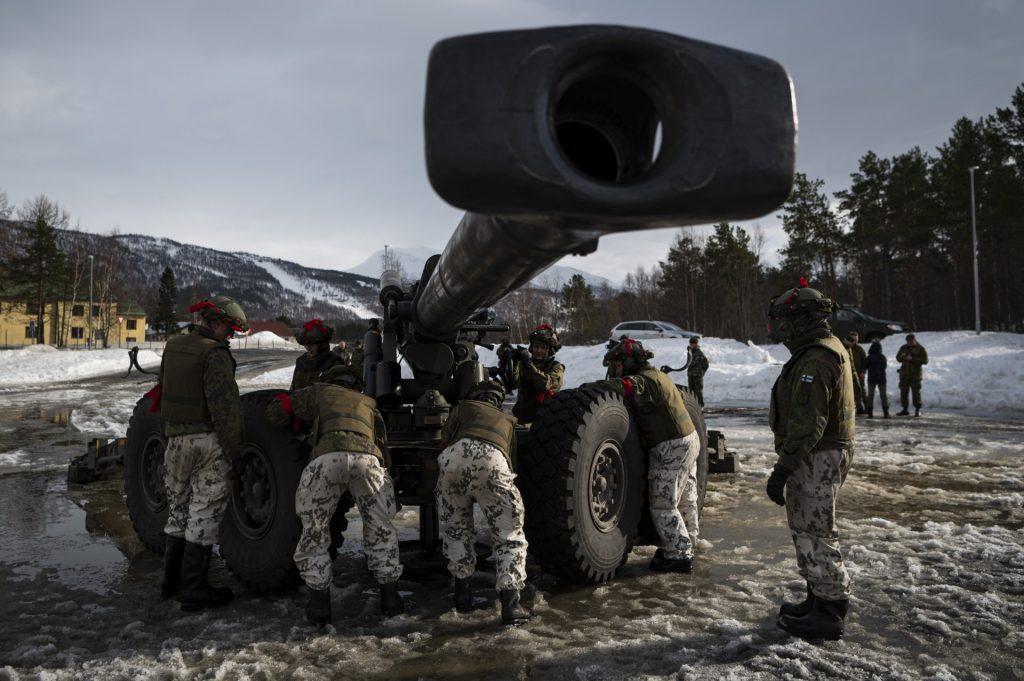 In this file photo taken on March 22, soldiers from the Finnish Defence Forces operate the Tampella 155 K 83-97, a Finnish towed 155mm field gun, as they participate in a international military exercise at Setermoen, Norway. Photo: AFP