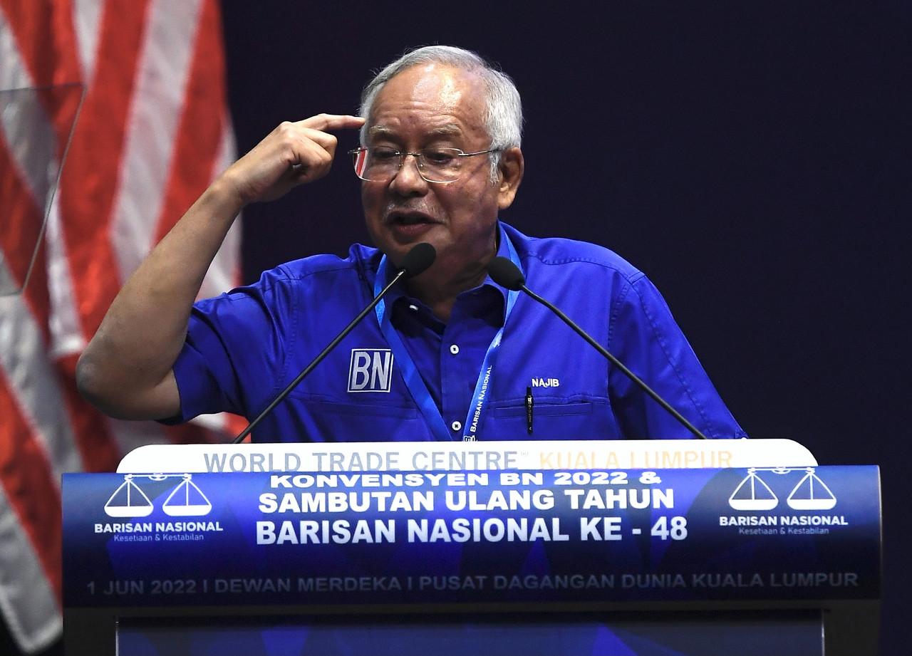 Former prime minister Najib Razak speaks at the Barisan Nasional convention in conjunction with its 48th anniversary celebration in Kuala Lumpur yesterday. Photo: Bernama