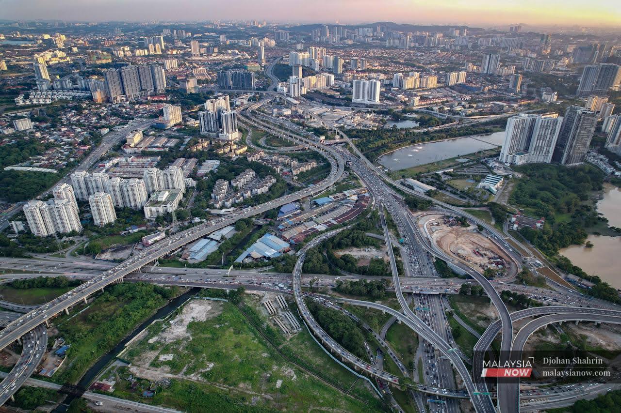 The capital city of Kuala Lumpur and part of its complex highway system seen in this aerial shot.