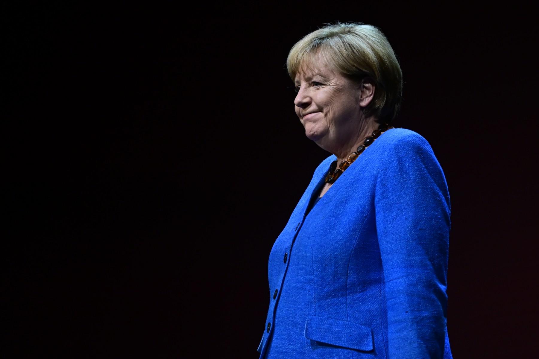Former German chancellor Angela Merkel arrives on stage for her first public interview since stepping down, at the Berliner Ensemble theatre in Berlin on June 7. Photo: AFP