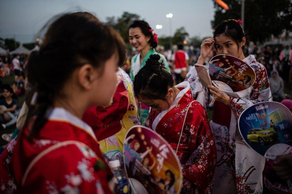 Gadis Jepun turut menghadiri festival tahunan Bon Odori di Shah Alam, Selangor, pada 20 Julai 2019. Gambar: AFP