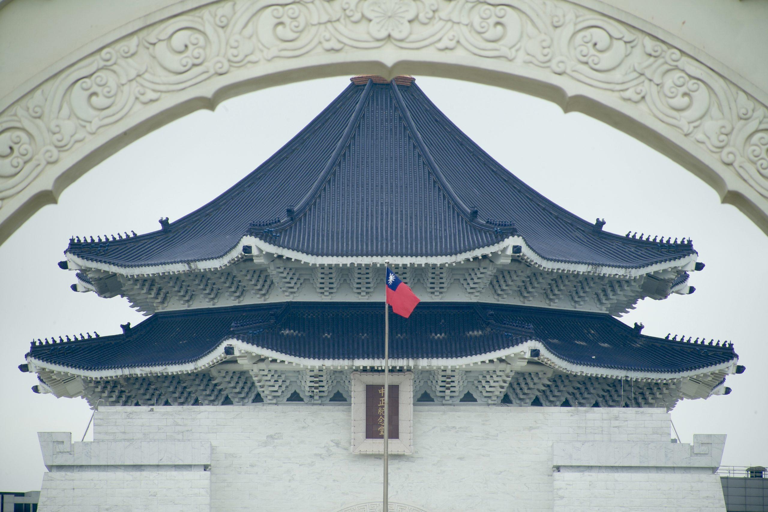 A Taiwan national flag flutters in front of the Chiang Kai-shek Memorial Hall in Taipei on May 24. China's defence minister has vowed China will 'fight to the very end' to stop any independence bid by Taiwan. Photo: AFP