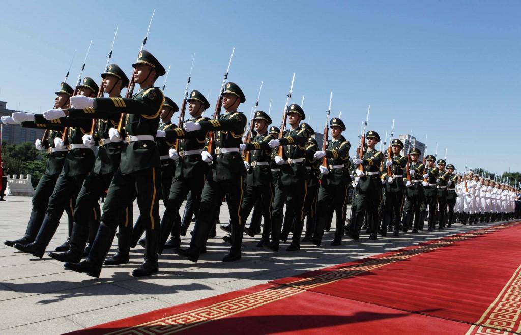 Chinese military troops march at the Bayi Building on Sept 18, 2012 in Beijing, China. Photo: AFP