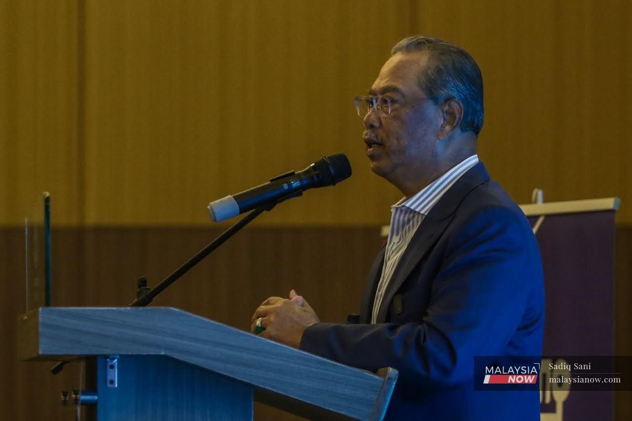 Muhyiddin Yassin speaks at an event at the Sime Darby Convention Centre in Kuala Lumpur today.