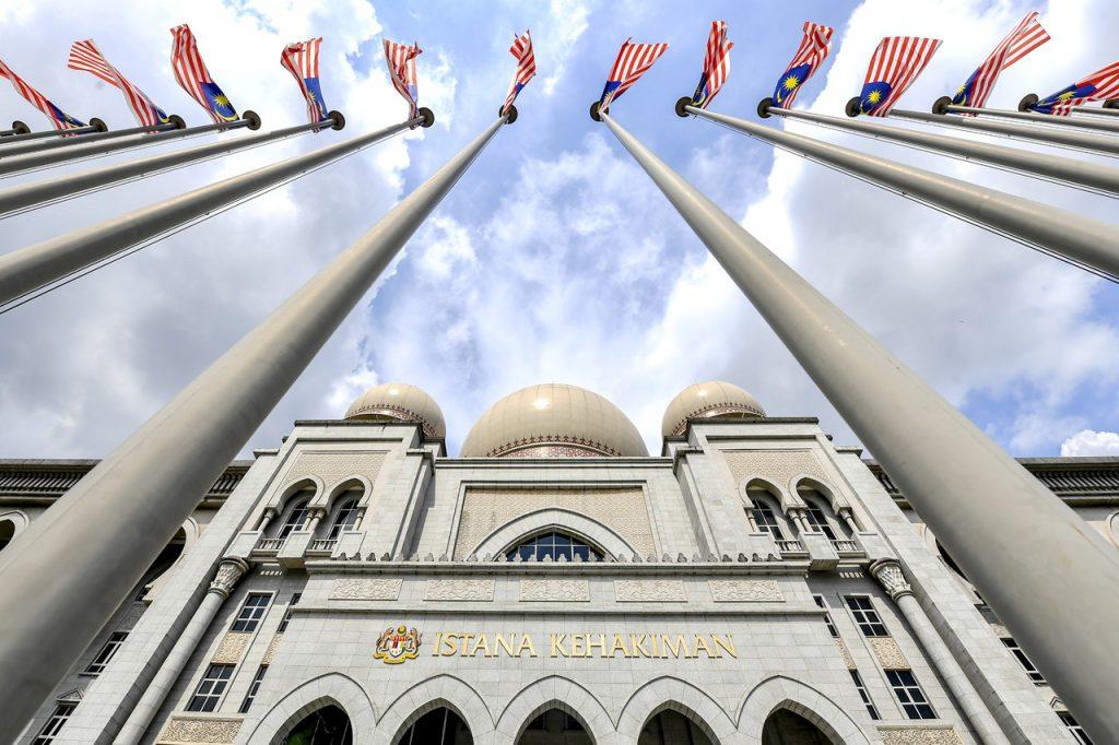 Malaysian flags wave in the breeze outside the Istana Kehakiman complex in Putrajaya which houses the Court of Appeal. Photo: Bernama