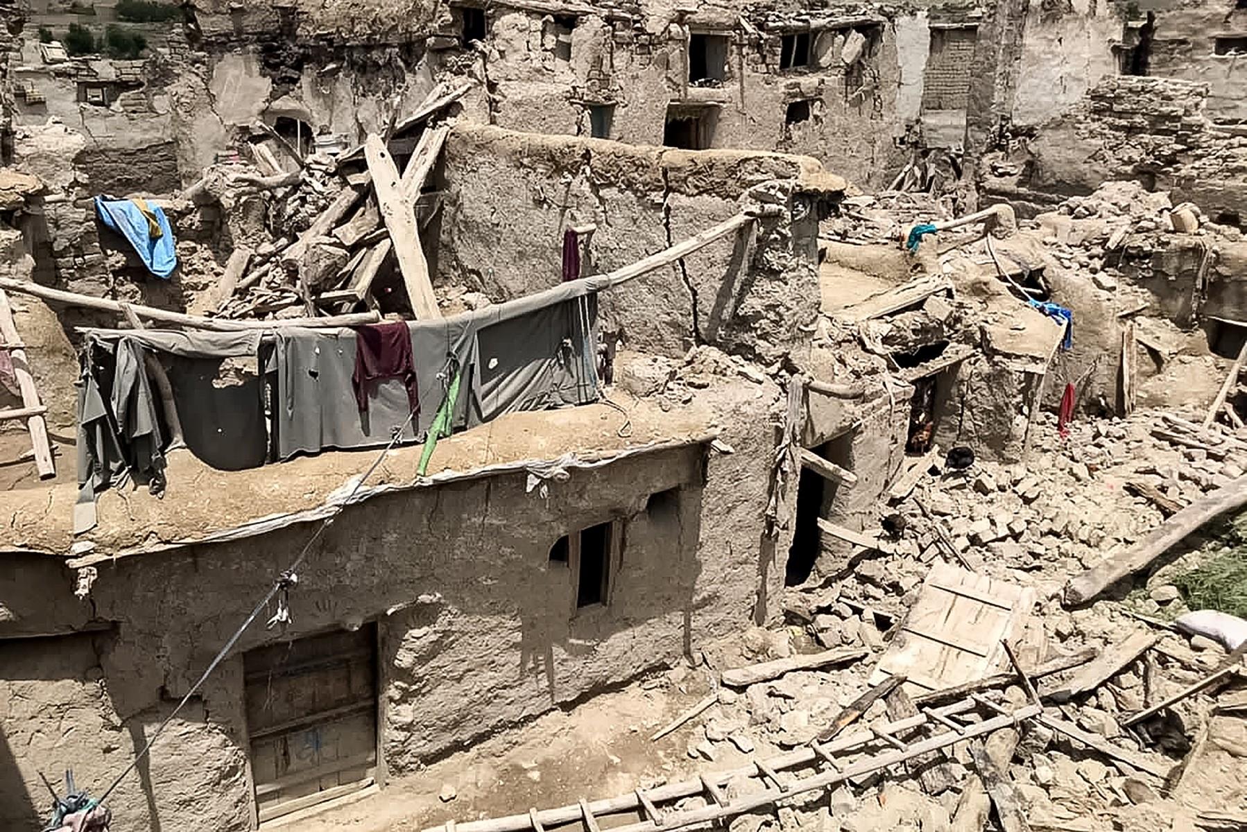 Damaged houses are pictured following an earthquake in Gayan district, Paktika province on June 22. Photo: AFP
