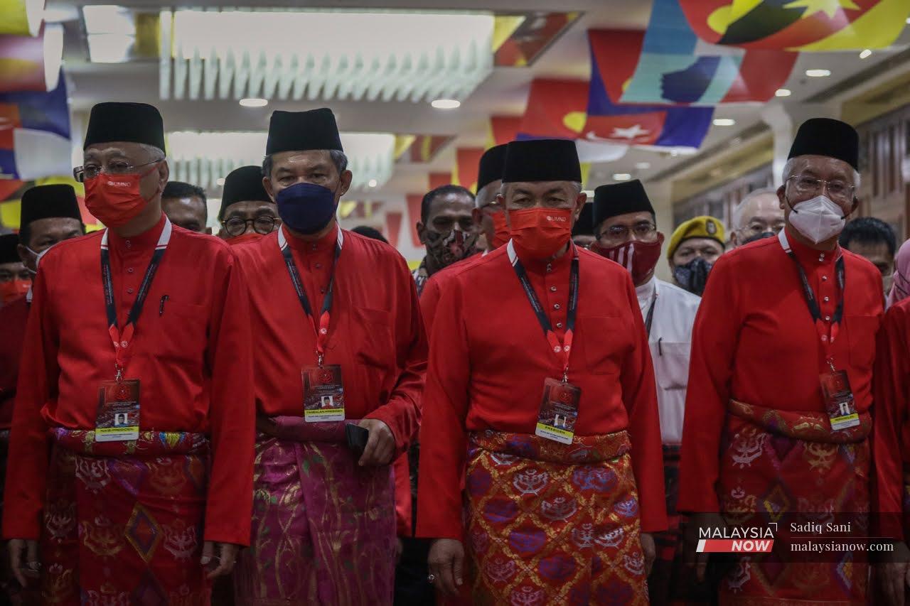 Umno president Ahmad Zahid Hamidi (second right) with vice-president and Prime Minister Ismail Sabri Yaakob (left), deputy president Mohamad Hassan (second left) and former leader Najib Razak (right) at the 2021 Umno general assembly at the World Trade Centre in Kuala Lumpur on March 19.