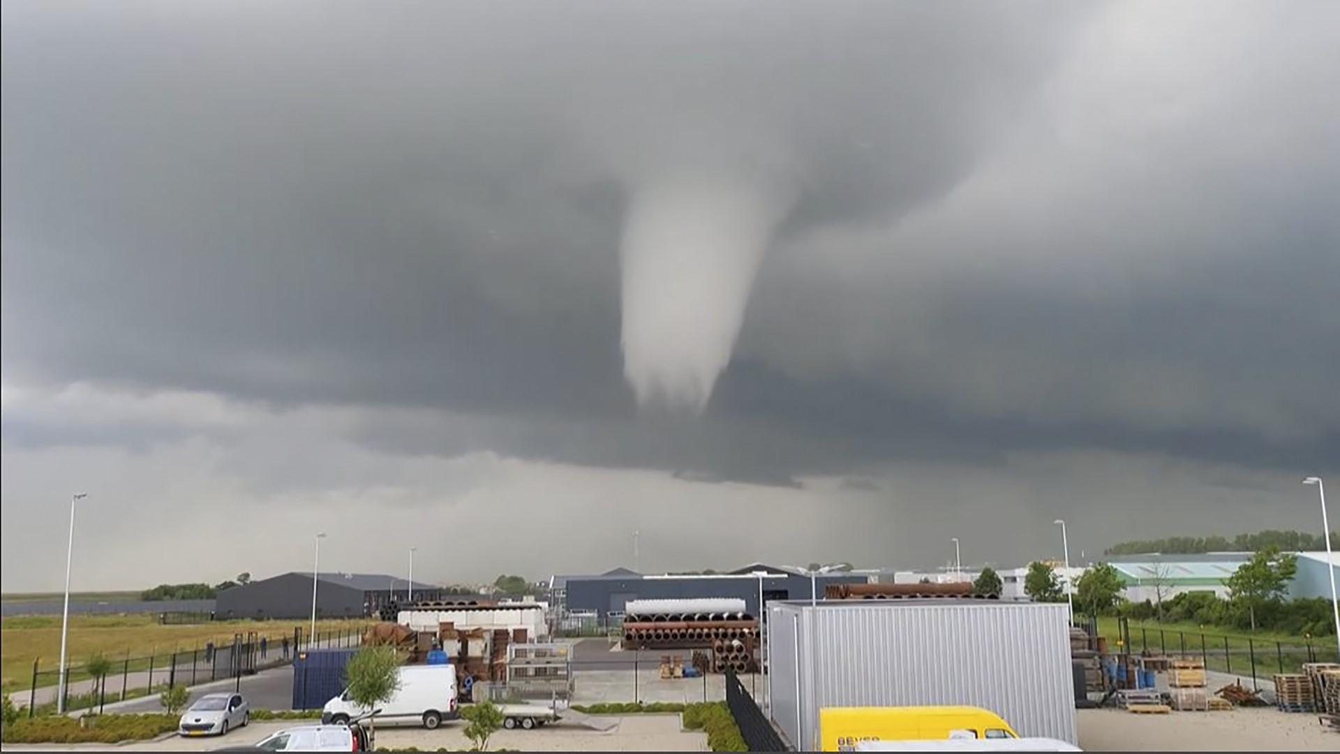 This video grab taken from footage courtesy of Julian Steenbakke shows a tornado on June 27 in Zierikzee, Netherlands. The tornado killed at least one person and injured 10 others in the first fatal twister to hit the Netherlands for three decades. Photo: AFP