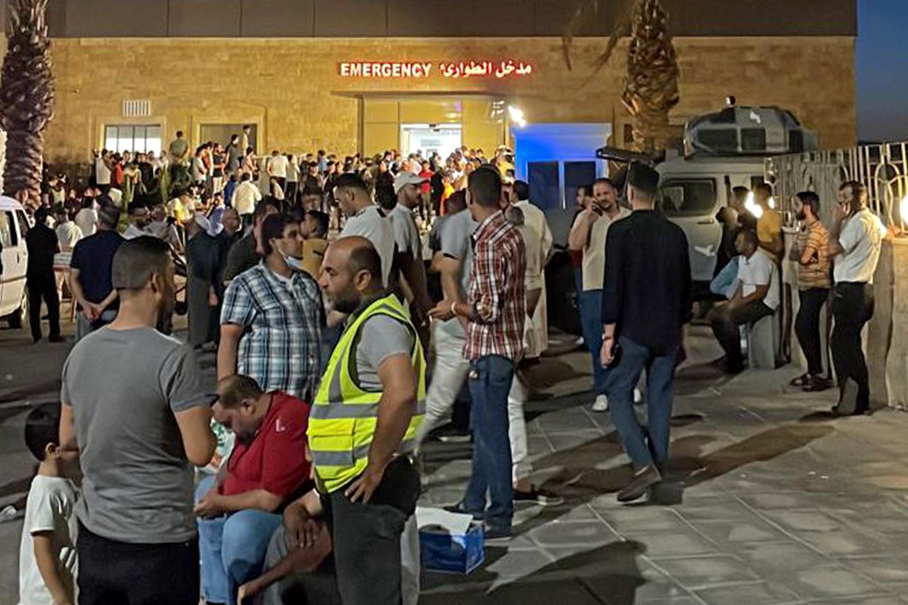 People gather outside a hospital following a toxic gas explosion in Jordan's Aqaba port, on June 27. Photo: AFP