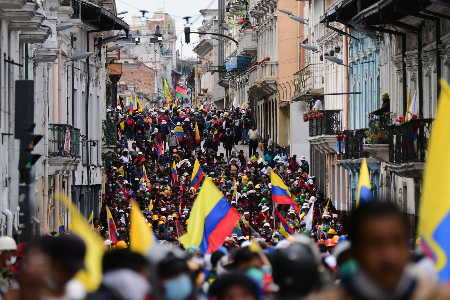 Indigenous people march towards the Carondelet Presidential Palace, in Quito, on June 27. Indigenous protesters in Ecuador have vowed to continue a disruptive country-wide protest against high living costs, rejecting a fuel price cut announced by the government as insufficient and 'insensitive'. Photo: AFP