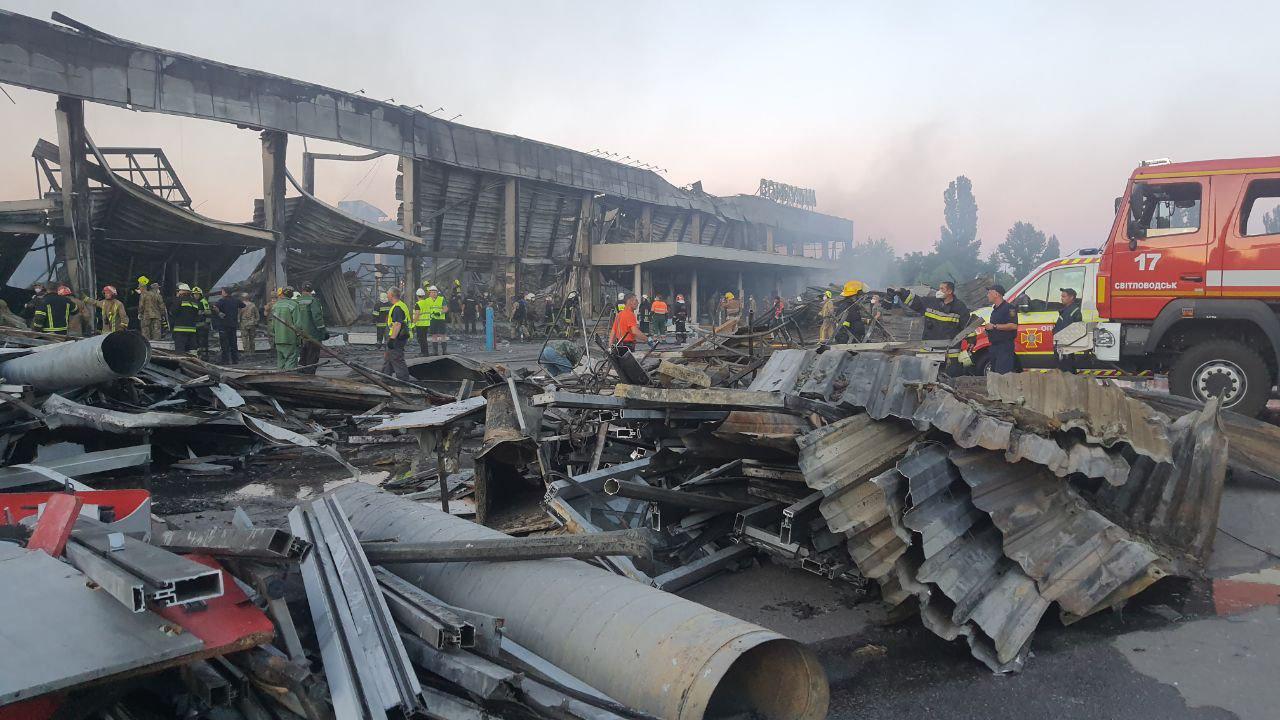 This handout picture taken and released by the Ukraine's State Emergency Service on June 27, shows rescuers working in a mall hit by a Russian missile strike in the eastern Ukrainian city of Kremenchuk. Photo: AFP