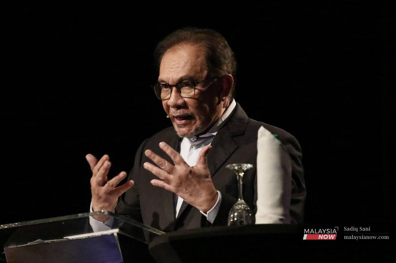 PKR president Anwar Ibrahim speaks at the recent Perdana Debate with former prime minister Najib Razak at the Malaysia Tourism Centre in Kuala Lumpur on May 12.