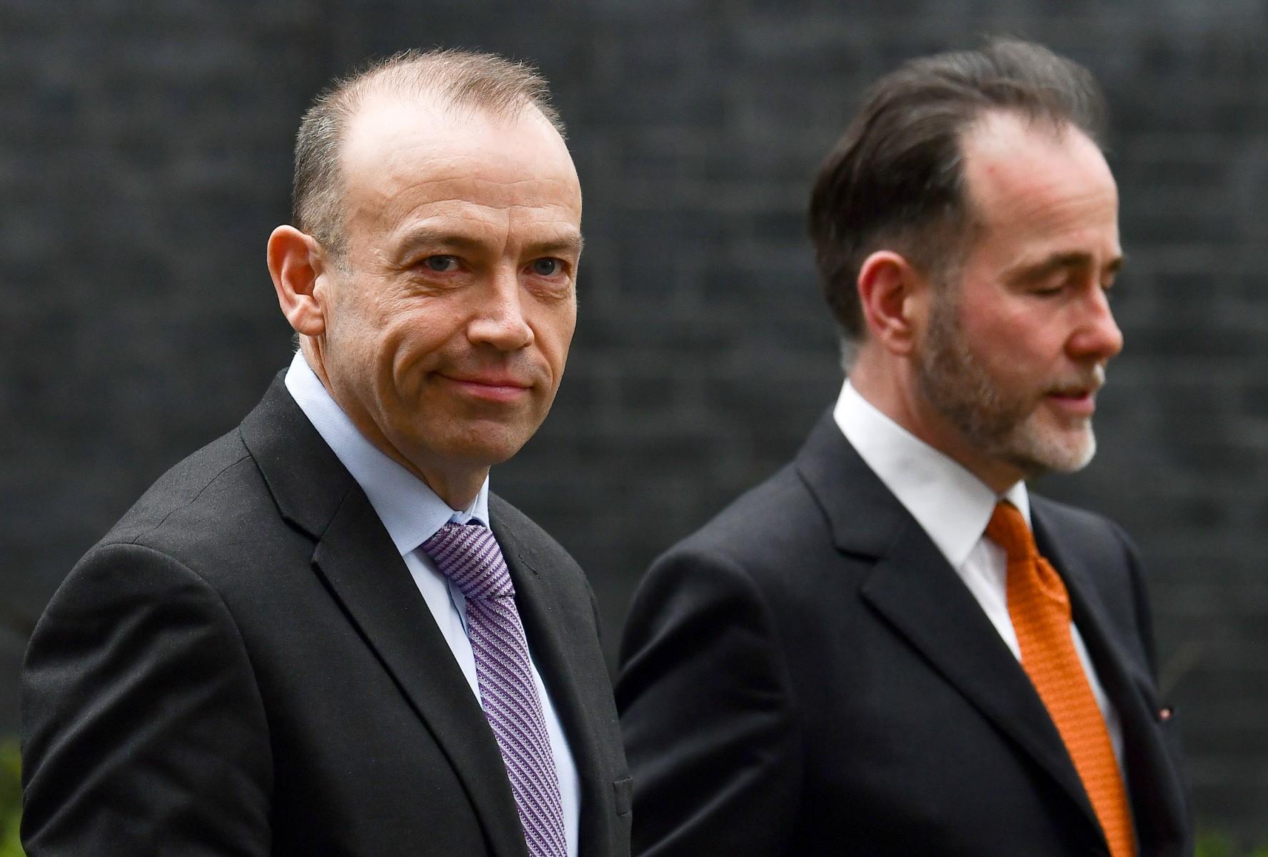 Britain's Chief Whip Chris Heaton-Harris (L) and Christopher Pincher, Minister of State for Housing, leave from 10 Downing Street in London on Feb 8. Photo: AFP
