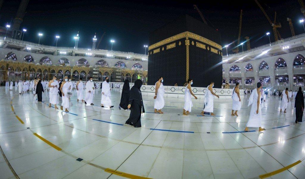 Pilgrims observe physical distancing as they circle the kaaba in Mecca, Saudi Arabia, in this picture taken during the Covid-19 pandemic in 2021. Photo: AFP