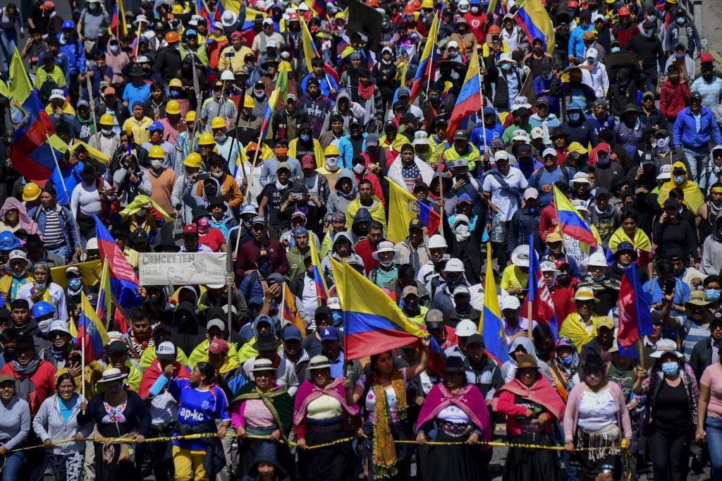 Demonstrators march in Quito on June 30, in the framework of indigenous-led protests against high living costs. Photo: AFP