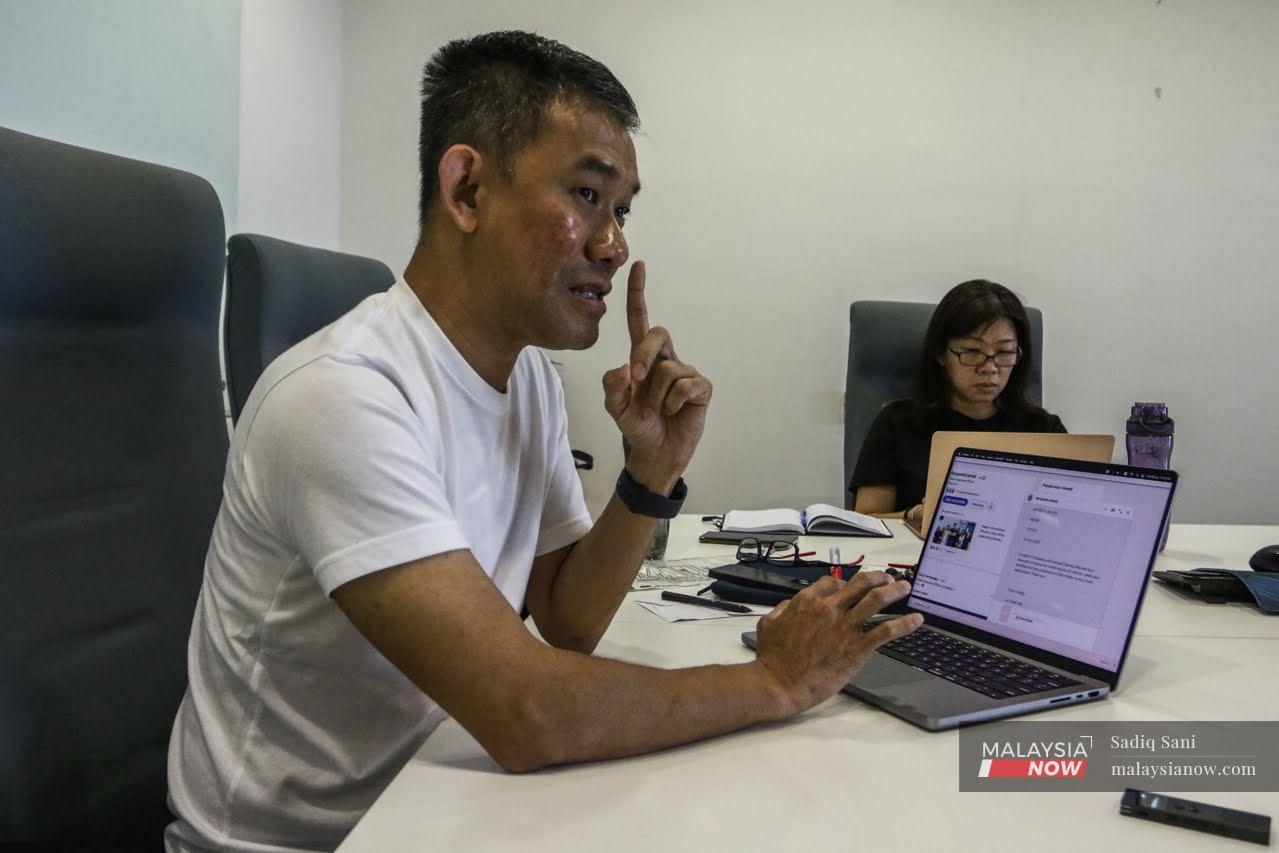 AirAsia X passenger Lui Thiam Fah shows email correspondence regarding his request to be refunded for 11 tickets on a flight that was cancelled.