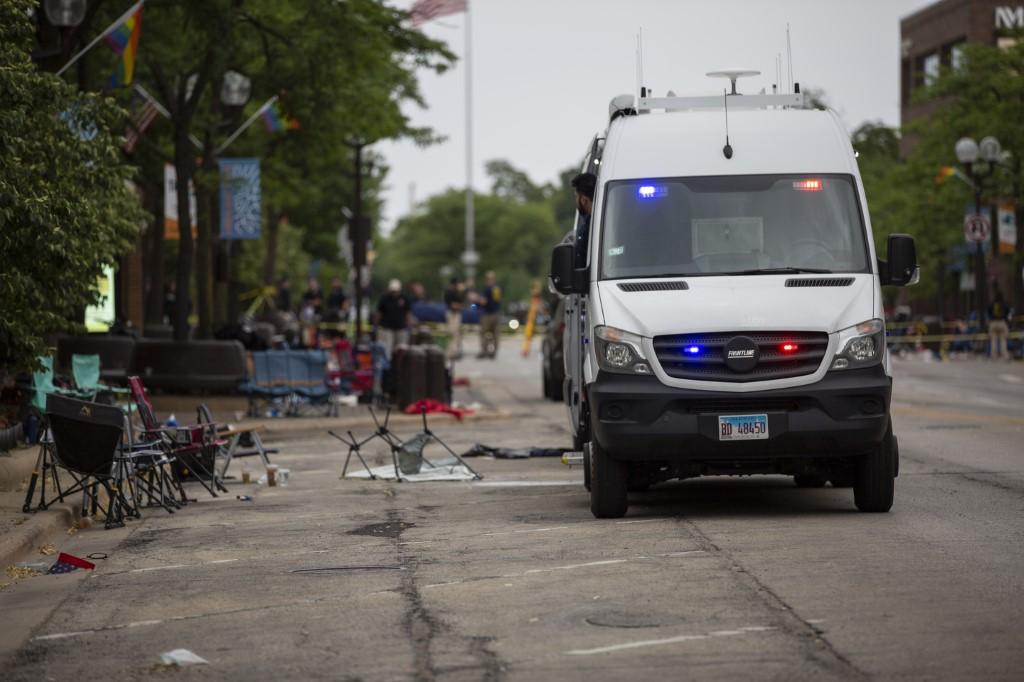 First responders work the scene of a mass shooting at a Fourth of July parade on July 4 in Highland Park, Illinois. Photo: AFP